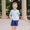 Boy wearing green stripe UPF 50+ tee and navy adventure boy short